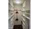 Well-organized closet with ample shelving and storage solutions, perfect for maximizing space at 5802 E Spring Rd, Scottsdale, AZ 85254
