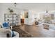 Bright living room with hardwood floors, open floor plan, and modern decor at 5802 E Spring Rd, Scottsdale, AZ 85254