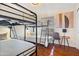 Inviting bedroom with bunk beds, hardwood floors and a bright window for lots of natural light at 6819 E Sheena Dr, Scottsdale, AZ 85254