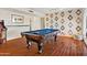 Spacious game room features a pool table and a vintage arcade game at 6819 E Sheena Dr, Scottsdale, AZ 85254