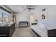 Bright, airy bedroom featuring a crib, a dresser, and a day bed under a ceiling fan for versatile use at 8135 N Central Ave # 1, Phoenix, AZ 85020