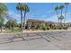 Apartment building featuring beautiful landscaping, palm trees, and multiple balconies at 8135 N Central Ave # 1, Phoenix, AZ 85020