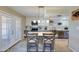 Updated kitchen featuring stainless steel appliances, quartz countertops, and a charming breakfast bar at 8135 N Central Ave # 1, Phoenix, AZ 85020