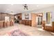 Expansive kitchen with custom wood cabinetry, stainless appliances, and a spacious center island at 8752 E Range Rider Trl, Mesa, AZ 85207