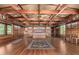 Open-concept main bedroom featuring custom wood beams, built-in storage, and integrated laundry at 8752 E Range Rider Trl, Mesa, AZ 85207
