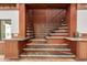 Detailed close-up of the staircase with custom wood and granite accents at 8752 E Range Rider Trl, Mesa, AZ 85207
