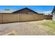 Fenced backyard featuring a mix of gravel and grass, ready for landscaping ideas at 8942 W Peck Dr, Glendale, AZ 85305