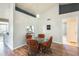 Cozy dining area featuring a glass table with seating for four and charming decor at 8942 W Peck Dr, Glendale, AZ 85305