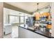 Charming kitchen featuring granite countertops, light wood cabinets, and stainless steel appliances at 8942 W Peck Dr, Glendale, AZ 85305