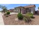 A well-maintained lawn with beautiful landscaping frames this attractive single-Gathering home at 9548 W Keyser Dr, Peoria, AZ 85383