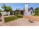 Private backyard oasis featuring manicured landscaping, including grass and gravel areas at 9636 N 53Rd Ave, Glendale, AZ 85302