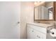Bathroom featuring vanity, a sink, and mirror at 9636 N 53Rd Ave, Glendale, AZ 85302