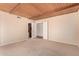 Bedroom with beamed wood ceiling, and view of closet at 9636 N 53Rd Ave, Glendale, AZ 85302