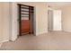 Bedroom featuring a closet with shelving and drawers at 9636 N 53Rd Ave, Glendale, AZ 85302