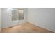 A simple bedroom with carpet, lamp, and baseboard with white wall at 10735 W Bermuda Dr, Avondale, AZ 85392