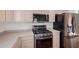 Close-up of kitchen showcasing stainless steel appliances and stylish countertop at 10735 W Bermuda Dr, Avondale, AZ 85392