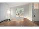 Bright room featuring carpet, large windows for natural light, and neutral walls at 10735 W Bermuda Dr, Avondale, AZ 85392