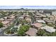 Stunning aerial view of a residential community with a pool and scenic mountain backdrop at 1225 N 36Th St # 1015, Phoenix, AZ 85008