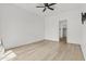 Bright bedroom features wood-look floors and a walk-in closet at 1225 N 36Th St # 1015, Phoenix, AZ 85008