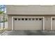 Attached two-car garage with brick paver driveway and tile roof at 1225 N 36Th St # 1015, Phoenix, AZ 85008