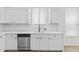 Bright kitchen featuring modern stainless steel appliances, white cabinets, and white countertops at 1225 N 36Th St # 1015, Phoenix, AZ 85008