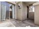 Outdoor patio showcasing sliding glass doors and a private entrance at 1225 N 36Th St # 1015, Phoenix, AZ 85008