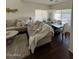 Inviting living room with comfortable sofas, chandelier lighting, and ample natural light at 13443 W Crocus Dr, Surprise, AZ 85379