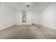 Spacious two-car garage with epoxy flooring and plenty of room for storage, features a water heater at 14045 W Desert Flower Dr, Goodyear, AZ 85395