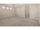 Spacious living room with natural light, creating an inviting atmosphere at 14045 W Desert Flower Dr, Goodyear, AZ 85395