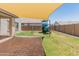 The property features an outdoor area with a play structure, and patio area for outdoor entertaining at 14435 W El Cortez Pl, Surprise, AZ 85387