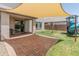Enjoy the private outdoor space with a shaded patio area and a play structure for endless fun and entertainment at 14435 W El Cortez Pl, Surprise, AZ 85387