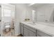 Bathroom with modern vanity, and shower-tub combo at 14435 W El Cortez Pl, Surprise, AZ 85387