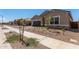 Charming single-Gathering home with a two-car garage, neutral colors, and a well-maintained landscape at 15833 W Bronco Trl, Surprise, AZ 85387
