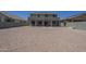 Large backyard ready for personalization, enhanced by a covered patio perfect for outdoor activities at 18174 E Via Jardin --, Gold Canyon, AZ 85118