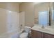 Full bathroom with shower-tub combo, single sink vanity and updated fixtures at 18174 E Via Jardin --, Gold Canyon, AZ 85118