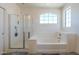 Bright bathroom featuring a separate shower and soaking tub at 18174 E Via Jardin --, Gold Canyon, AZ 85118