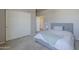 This carpeted bedroom has a headboard and closet at 18174 E Via Jardin --, Gold Canyon, AZ 85118