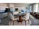 Stylish dining area featuring a modern table with seating for four, adjacent to the kitchen at 18174 E Via Jardin --, Gold Canyon, AZ 85118