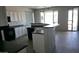 Well-equipped kitchen boasts a breakfast bar, ample counter space, and backyard access at 18174 E Via Jardin --, Gold Canyon, AZ 85118