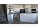 Bright kitchen featuring white cabinets and modern appliances, perfect for cooking and entertaining at 18174 E Via Jardin --, Gold Canyon, AZ 85118