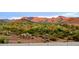 Scenic desert landscape featuring mountains at sunset with cacti and native vegetation at 18174 E Via Jardin --, Gold Canyon, AZ 85118