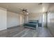 This is a spacious main bedroom with wood-look floors at 18174 E Via Jardin --, Gold Canyon, AZ 85118