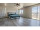 Bright main bedroom with sliding glass doors to a balcony and mountain views at 18174 E Via Jardin --, Gold Canyon, AZ 85118