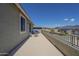 Enjoy the serene mountain views from this wide, covered patio with lounge seating and table at 18174 E Via Jardin --, Gold Canyon, AZ 85118