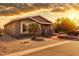 Charming single-story home with low-maintenance desert landscaping and a cozy front porch at 201 S Greenfield Rd # 173, Mesa, AZ 85206