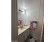 Bright bathroom with a well-lit vanity and ample storage, creating a clean and functional space at 2359 S Tomahawk Rd, Apache Junction, AZ 85119