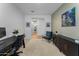 Well-lit home office with a view into the hallway and stylish decor, perfect for productive work at 27510 N 30Th Ln, Phoenix, AZ 85083