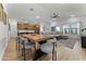 Open floor plan showcases dining area, kitchen, and spacious living room with lots of natural light at 27510 N 30Th Ln, Phoenix, AZ 85083
