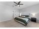 Bright main bedroom with carpet, a ceiling fan, and neutral decor for a calm, inviting space at 27510 N 30Th Ln, Phoenix, AZ 85083