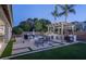 Enjoy outdoor living with a pool, fire pit, and outdoor kitchen at 3237 E Park Ave, Gilbert, AZ 85234